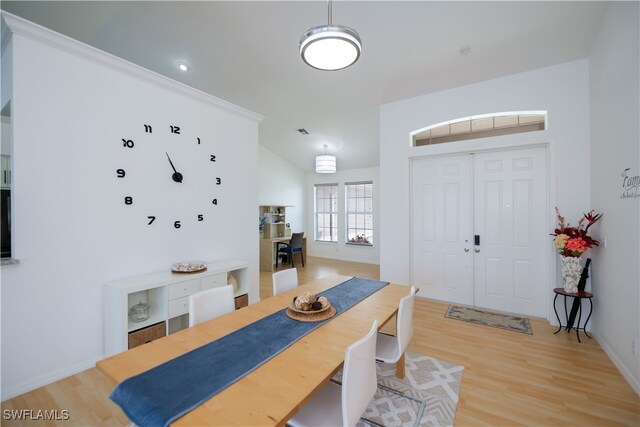 dining area with light wood-style floors