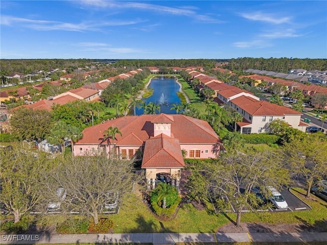 aerial view with a water view and a residential view