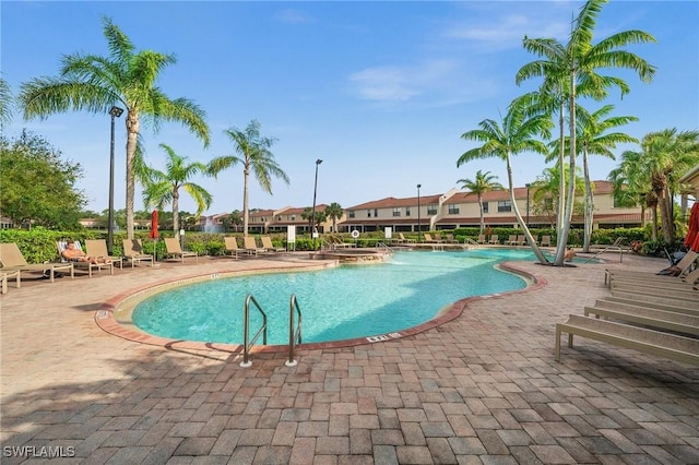 pool with a patio