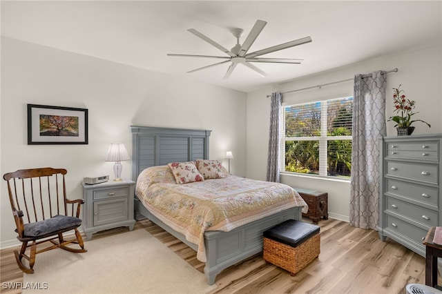 18512 Marlin Kite Ln, North Fort Myers, FL 33917 - bedroom with light wood-style flooring, baseboards, and a ceiling fan