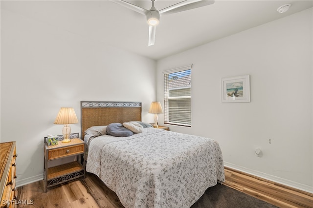 18512 Marlin Kite Ln, North Fort Myers, FL 33917 - bedroom featuring ceiling fan, baseboards, and wood finished floors