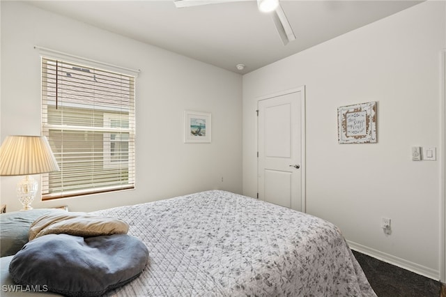 18512 Marlin Kite Ln, North Fort Myers, FL 33917 - carpeted bedroom featuring ceiling fan and baseboards