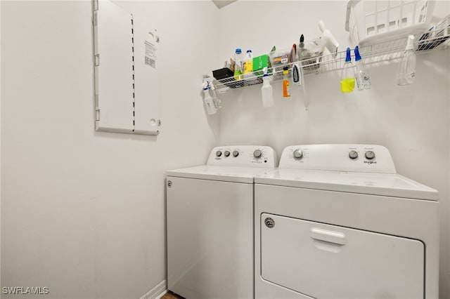 18512 Marlin Kite Ln, North Fort Myers, FL 33917 - clothes washing area with laundry area, separate washer and dryer, and baseboards