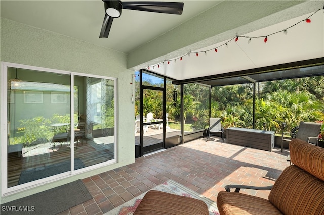 18512 Marlin Kite Ln, North Fort Myers, FL 33917 - sunroom featuring a ceiling fan