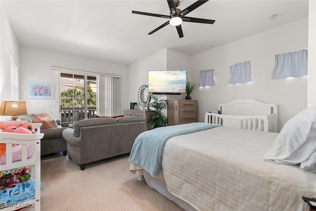 bedroom with light carpet, access to outside, vaulted ceiling, and a ceiling fan