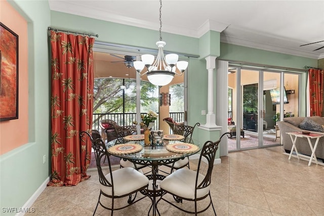 dining area featuring crown molding, decorative columns, baseboards, and light tile patterned floors