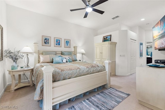 bedroom featuring light carpet, ceiling fan, visible vents, and baseboards