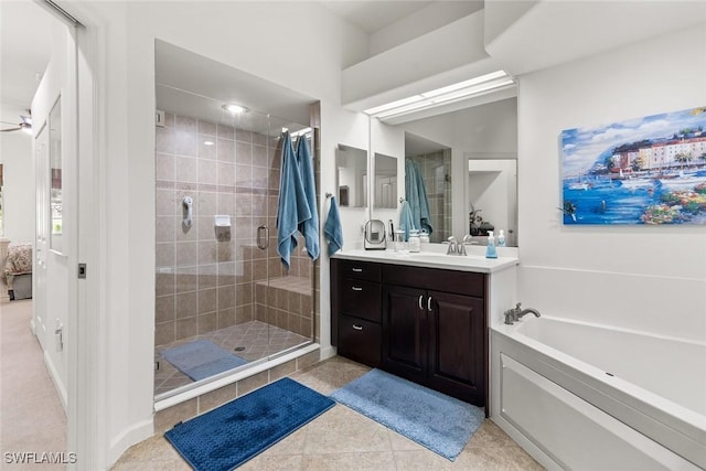 bathroom featuring connected bathroom, tile patterned floors, a garden tub, vanity, and a shower stall