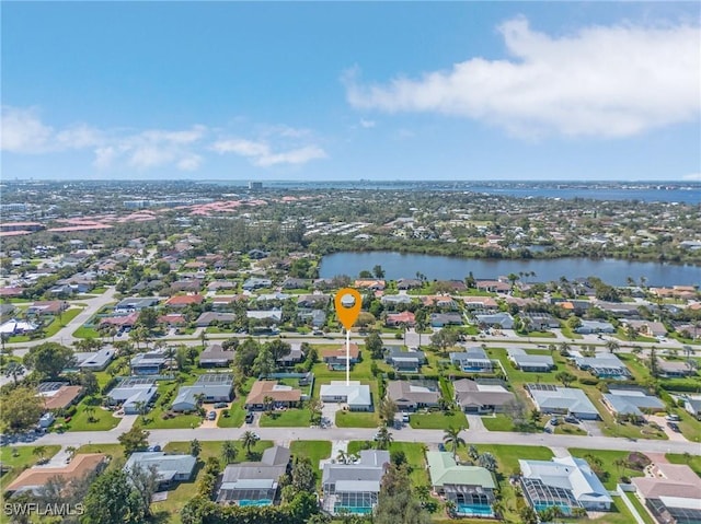 bird's eye view with a water view