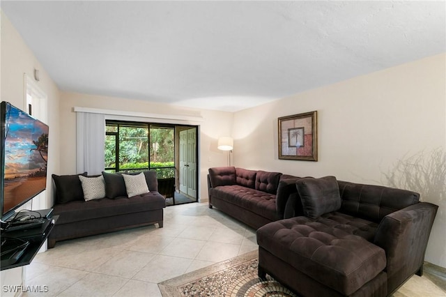 living room featuring light tile patterned floors