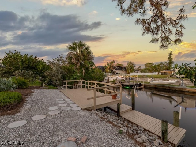 view of dock with a water view