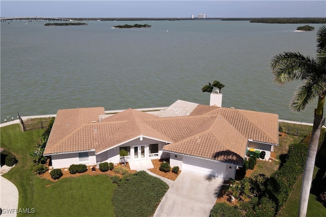 drone / aerial view featuring a water view