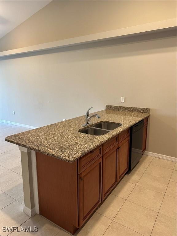 kitchen featuring dark stone counters, black dishwasher, vaulted ceiling, light tile patterned floors, and a sink