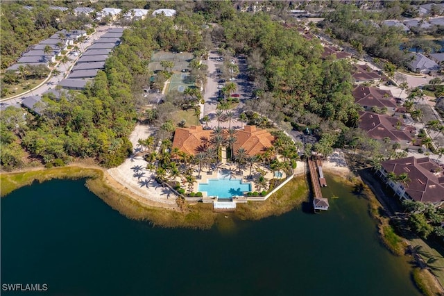 bird's eye view featuring a water view and a residential view