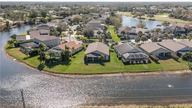 aerial view featuring a water view and a residential view