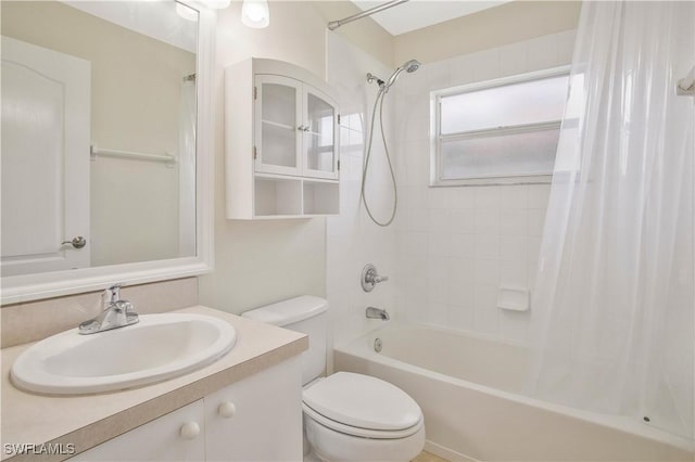 bathroom featuring shower / tub combo, vanity, and toilet