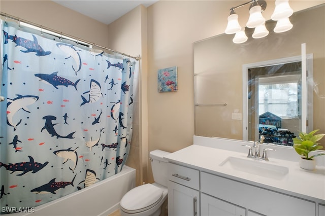 full bathroom with toilet, shower / bath combo, a notable chandelier, and vanity