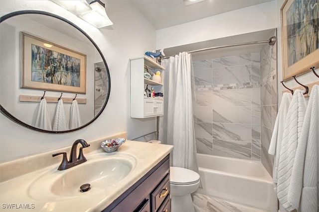 bathroom featuring toilet, marble finish floor, shower / tub combo, and vanity