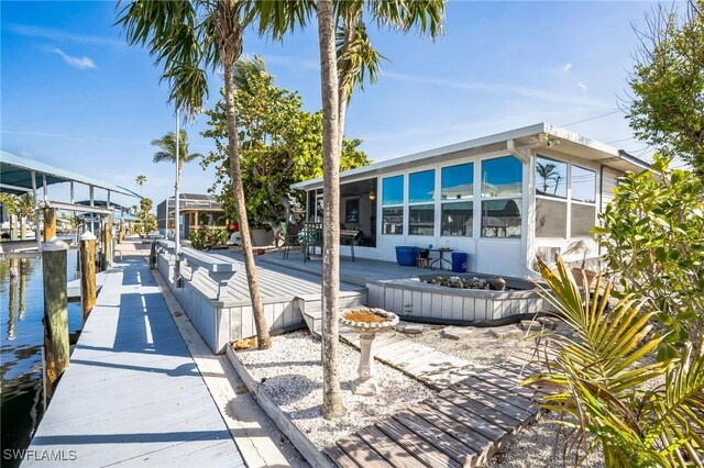 16221 Buccaneer St, Bokeelia, FL 33922 - view of swimming pool with a dock