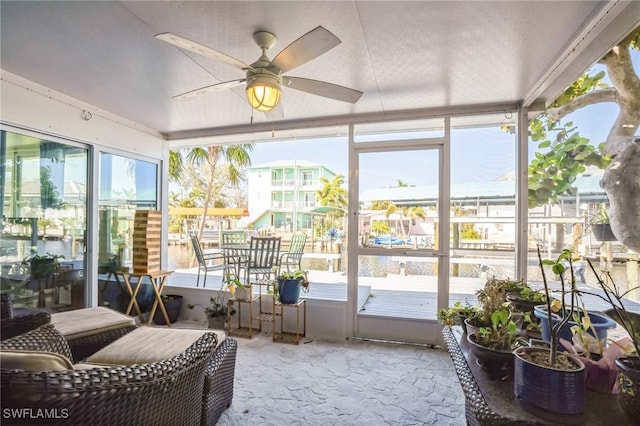 16221 Buccaneer St, Bokeelia, FL 33922 - sunroom / solarium with a wealth of natural light and a ceiling fan