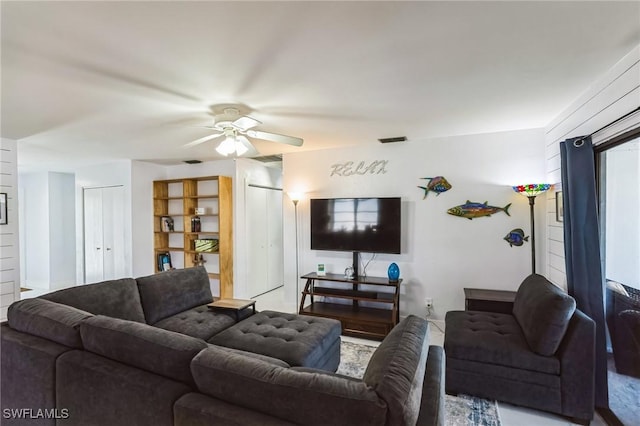 16221 Buccaneer St, Bokeelia, FL 33922 - living room with visible vents and a ceiling fan
