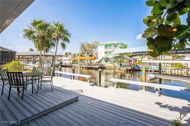 16221 Buccaneer St, Bokeelia, FL 33922 - view of dock featuring a water view