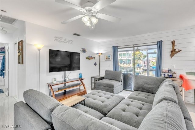 16221 Buccaneer St, Bokeelia, FL 33922 - living room featuring visible vents and ceiling fan
