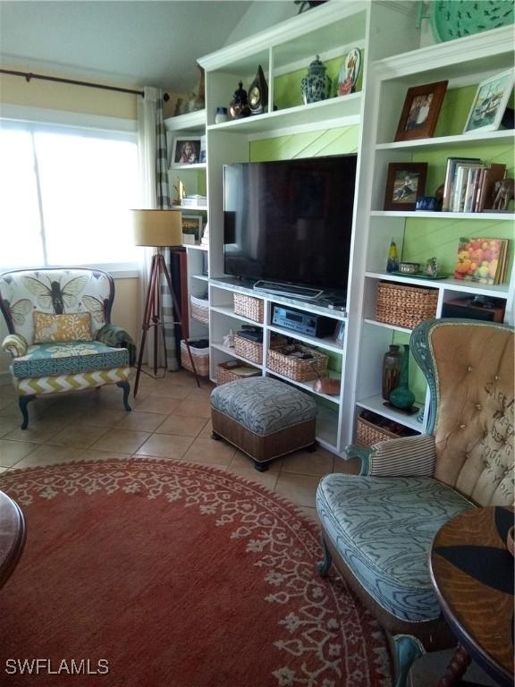 sitting room featuring tile patterned floors