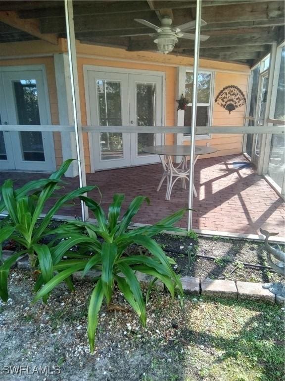 view of patio with a ceiling fan and french doors