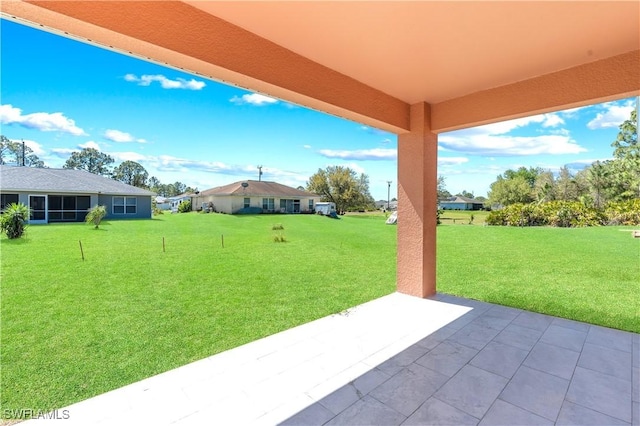 view of yard with a patio area