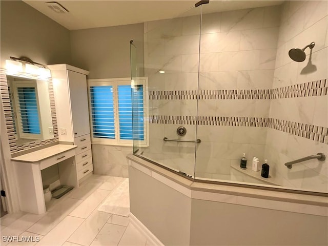 full bath featuring visible vents and a walk in shower