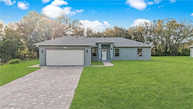 ranch-style home featuring an attached garage, roof with shingles, decorative driveway, stucco siding, and a front lawn