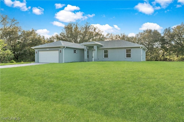 ranch-style home with a garage, a front yard, driveway, and stucco siding