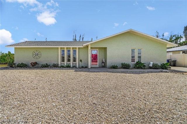 single story home featuring stucco siding