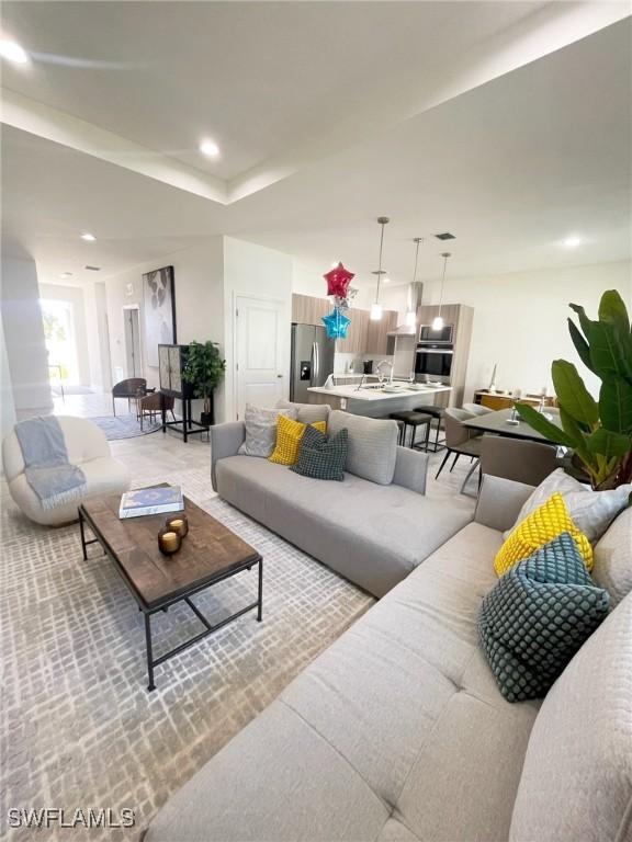 living area featuring recessed lighting