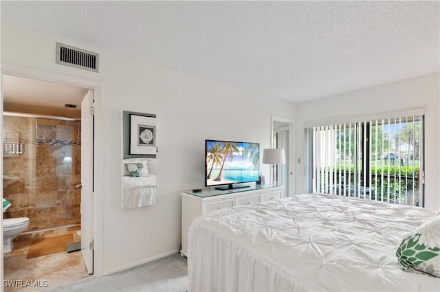 bedroom with visible vents, light carpet, connected bathroom, a textured ceiling, and access to outside