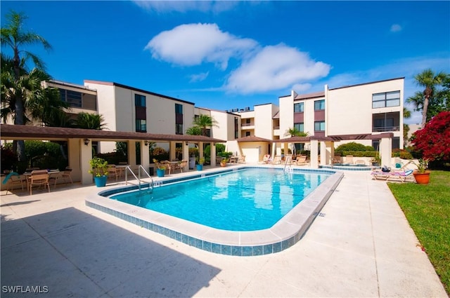 community pool featuring a patio