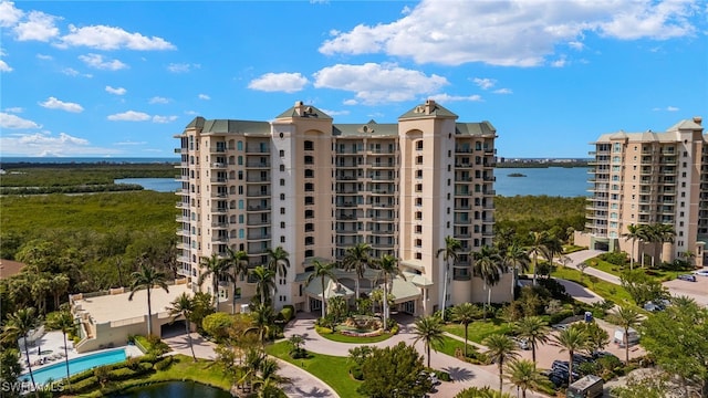 view of building exterior with a water view