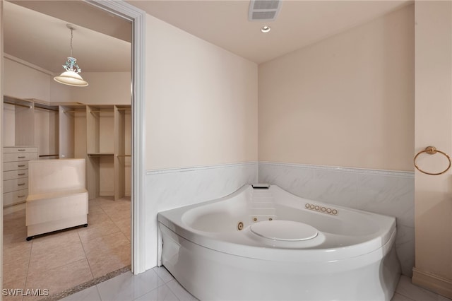 full bath with a whirlpool tub, tile patterned flooring, visible vents, and recessed lighting