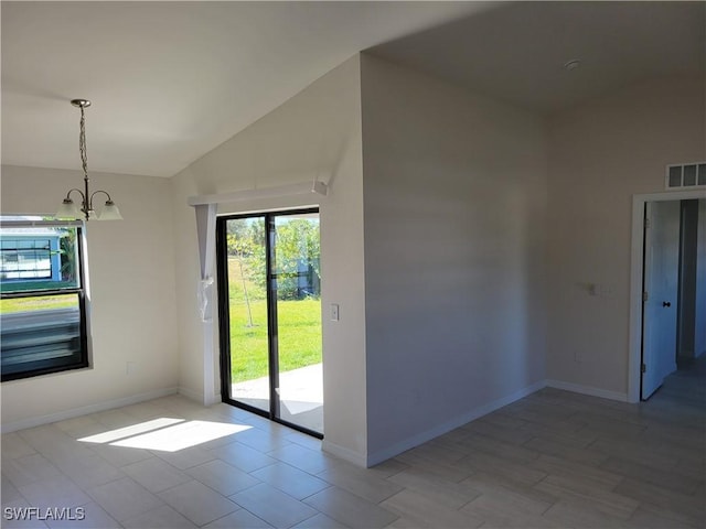 interior space with lofted ceiling, baseboards, visible vents, and an inviting chandelier