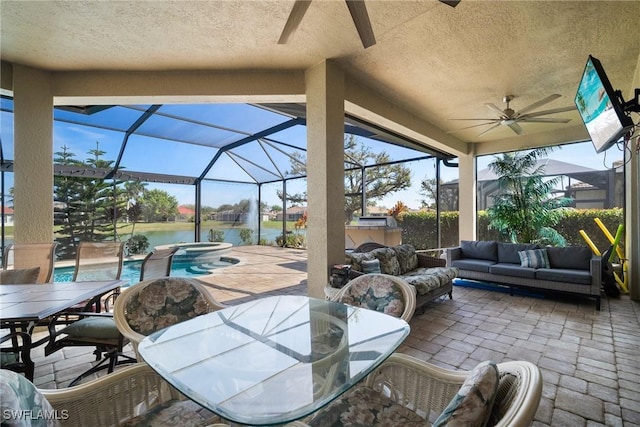 view of patio with an outdoor hangout area, glass enclosure, outdoor dining area, and a water view