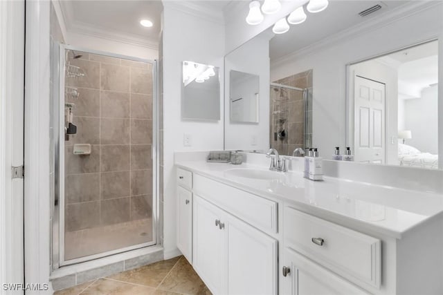 full bathroom with tile patterned flooring, vanity, visible vents, ornamental molding, and a shower stall