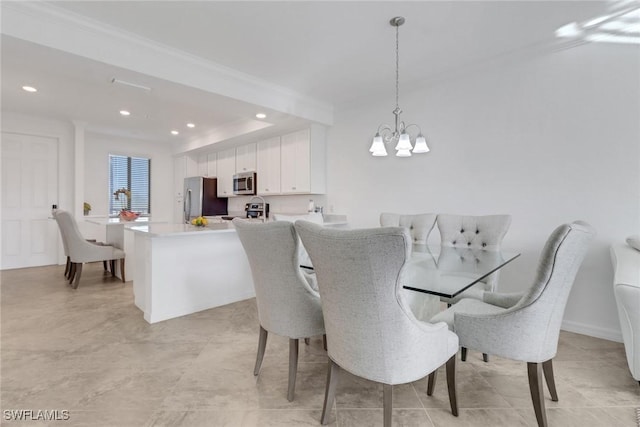 dining room with a chandelier, recessed lighting, crown molding, and baseboards