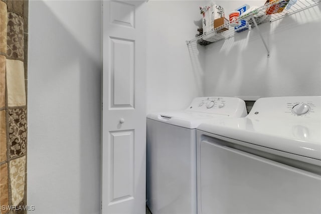 laundry area featuring separate washer and dryer