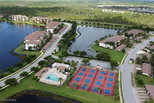 bird's eye view with a water view and a residential view