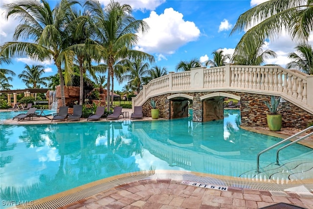 pool with a patio area