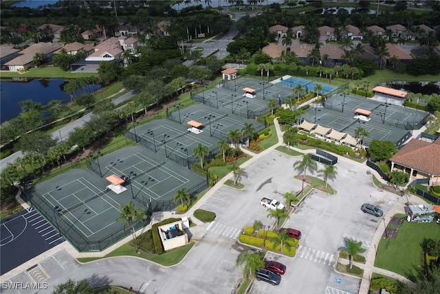 aerial view with a residential view and a water view