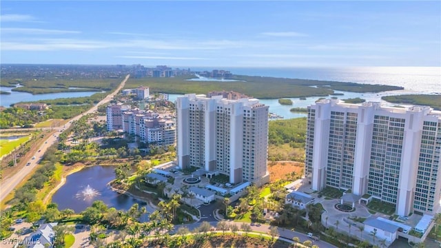 bird's eye view featuring a city view and a water view