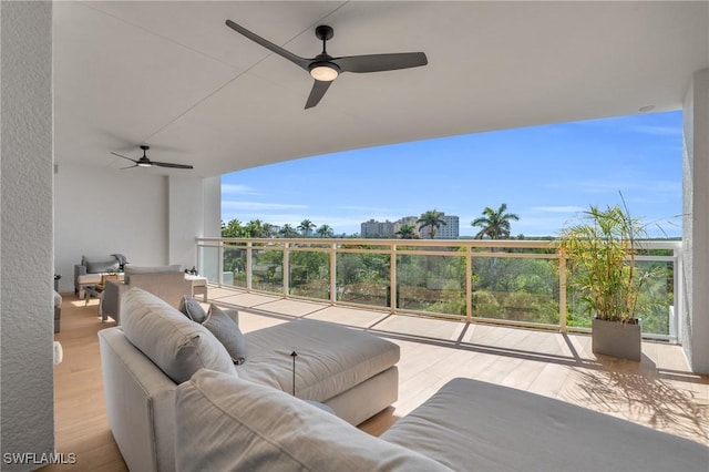 interior space featuring wood finished floors and floor to ceiling windows