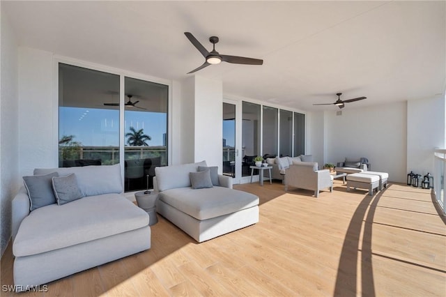 view of patio / terrace featuring a ceiling fan and an outdoor hangout area